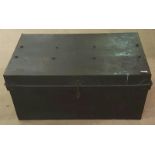 AN EARLY 20TH CENTURY STEEL TRUNK Having ebonised finish with exposed bolts and rivets.