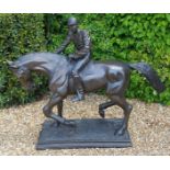 A THREE QUARTER LIFE SIZE BRONZE STUDY OF A HORSE AND JOCKEY On stepped plinth base, signed. (