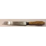 WESTHOLME & SON, SHEFFIELD, A 19TH CENTURY STEEL AND IVORY BREAD KNIFE The handled carved as sheaf