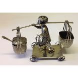 AN EARLY 20TH CENTURY CHINESE SILVER CRUET In the form of a peasant on cart with articulated wheels,