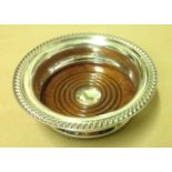 BARKER ELLIS, A MODERN HALLMARKED SILVER WINE COASTER Wooden base and gadroon rim, hallmarked for