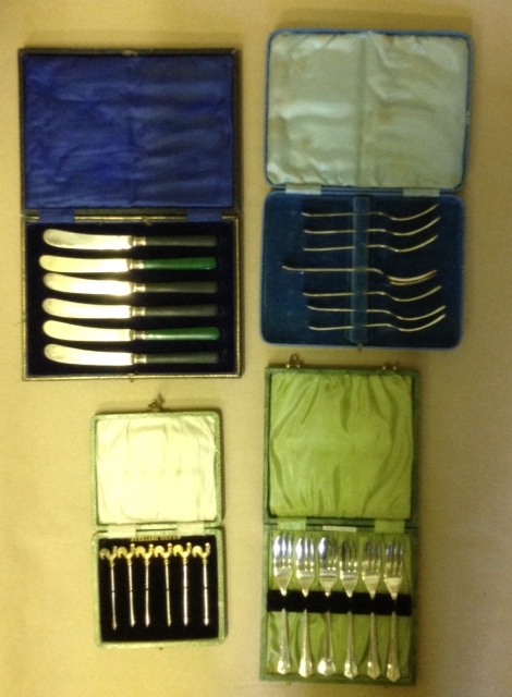 A CASED SET OF SIX SILVER COCKTAIL STICKS With cockerel tops, together with two cased sets of Art