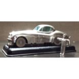 PRAMETTA, KOLN-HOHENBERG, A VINTAGE PEWTER CLOCKWORK MODEL CAR, JAGUAR XK120 COUPE Working, steering