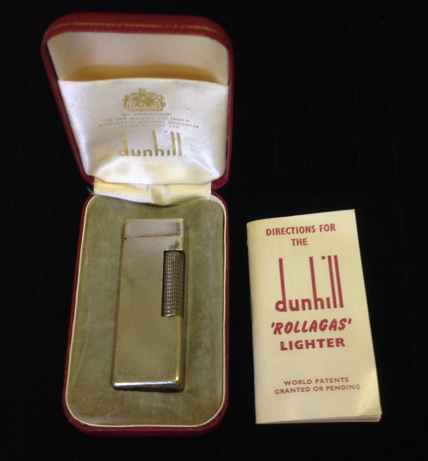 DUNHILL, A SILVER PLATED ROLLAGAS 1968 LIGHTER Cased with directions. (6.2cm x 2.3cm x 1.1cm)