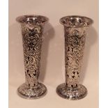 A PAIR OF VICTORIAN HALLMARKED SILVER TRUMPET VASES Of tapering cylindrical shape, with pierced