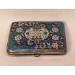 IN THE MANNER OF FABERGE, A LATE 19TH/EARLY 20TH CENTURY RUSSIAN SILVER AND ENAMEL CIGARETTE CASE Of