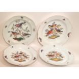 MEISSEN, A SET OF FOUR 20TH CENTURY PORCELAIN PLATES Hand painted with three exotic birds, perched