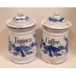 A PAIR OF ANTIQUE STONEWARE BLUE AND WHITE STORAGE JARS One marked 'Tapioca' and the other 'Coffee',