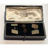 AN EARLY 20TH CENTURY 9CT GOLD CUFFLINKS AND STUD SET With engine turned decoration, contained in