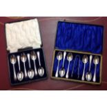 TWO EARLY 20TH CENTURY HALLMARKED SILVER SETS OF SIX TEASPOONS One with tongs, in fitted cases,