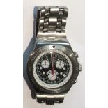 SWATCH IRONY, A GENTLEMEN'S STAINLESS STEEL WRISTWATCH With a circular black dial, three