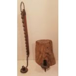 AN 18TH CENTURY FRUITWOOD SAW TOOTH HANGING CANDLE HOLDER Along with a pine wall sconce and single