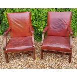 A PAIR OF 19TH CENTURY GAINSBOROUGH OPEN ARMCHAIRS Upholstered in red leather and raised on mahogany