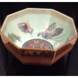 AN EARLY 20TH CENTURY WEDGWOOD LUSTRE WARE BOWL Of octagonal shape, having an orange ground with