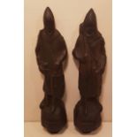 A PAIR OF STAINED WOODEN CARVED STATUES Medieval knights. (8.5cm x 33cm)