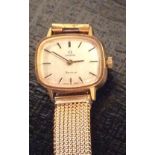 OMEGA, GENÈVE, A LADIES' VINTAGE GOLD PLATED WRISTWATCH With rectangular silver tone dial, with