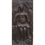 A 15TH CENTURY CONTINENTAL OAK PANEL Deeply carved with a maiden, surrounded by leaves and fruit,