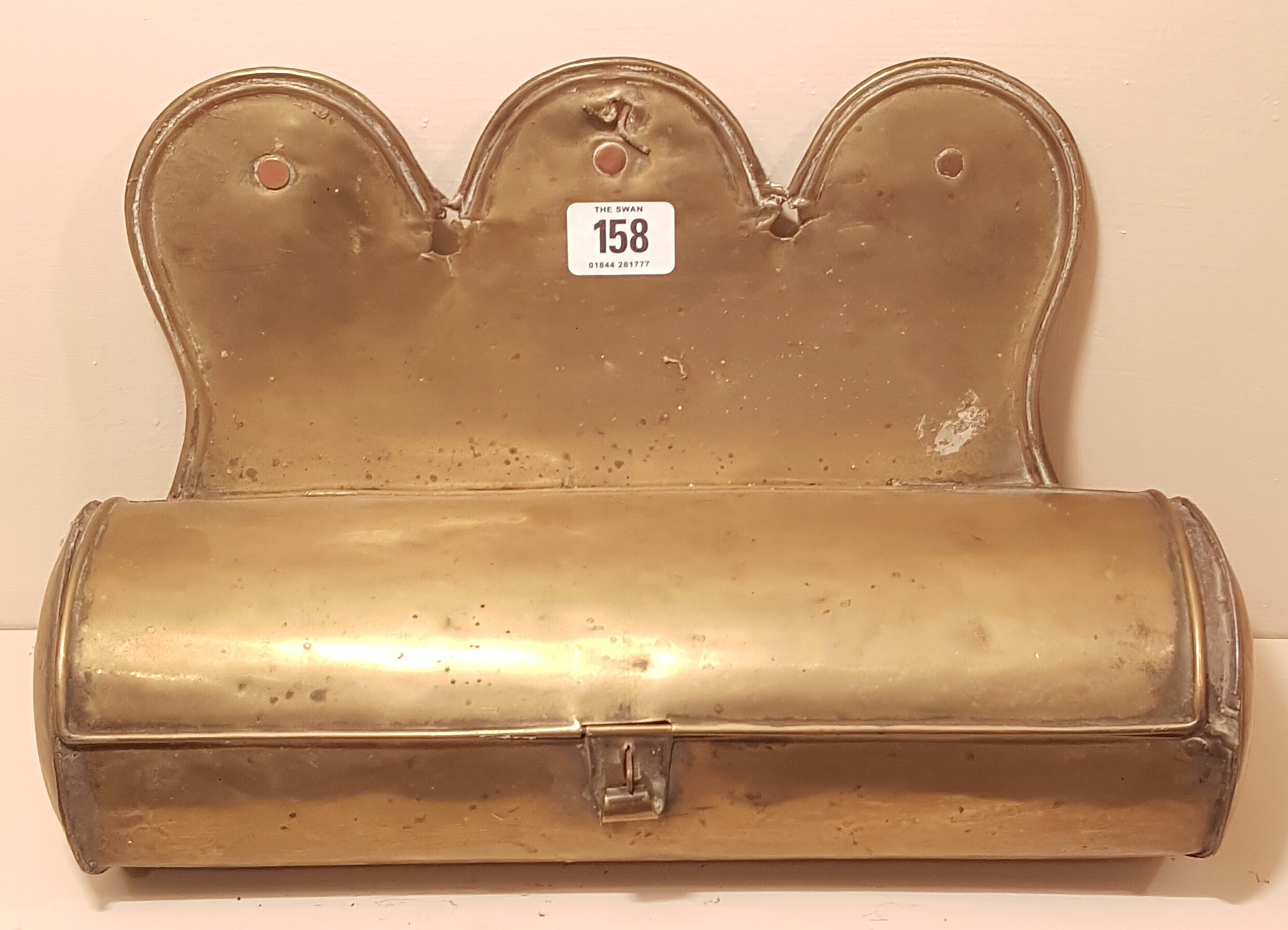 A LATE 18TH CENTURY SHEET BRASS CANDLE BOX With shaped hanging apron, Circa 1790. (36cm x 24cm x