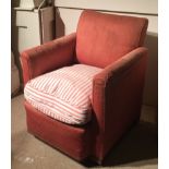 LENYGON & MORANT (EARLY HOWARD), A LATE 19TH CENTURY TUB ARMCHAIR In distressed upholstery, standing