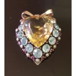 A MID 20TH CENTURY HEART FORM SILVER AND MULTI GEMSET DRESS/FUR CLIP The large heart form citrine