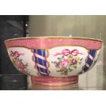 A 19TH CENTURY SAMPSON FRUIT BOWL In the manner of Sèvres, decorated with floral bouquets, on a