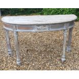 A 19TH CENTURY CONSOLE TABLE The 'D' shaped cream veined marble top, supported on mahogany limed