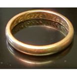 A 17TH CENTURY GOLD POSY RING The 'D' section gold band, with an inscription to inner face, in