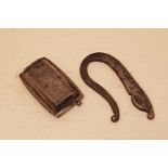 AN 18TH CENTURY HINGED STEEL TRAVELLING TINDER BOX Near a rectangular panel form and a zoomorphic