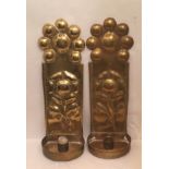 A PAIR OF HEAVY BRASS WALL SCONCES With floral repoussé decoration and dated 1695. (9cm x 30cm x