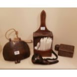 AN ANTIQUE WOODEN COW BELL Along with a candle box, a carved salt box and an early leather powder