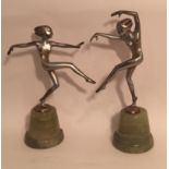 AFTER JOSEF LORENZL, A PAIR OF SILVERED BRONZE STATUES Of nude dancing girls, on green onyx base. (