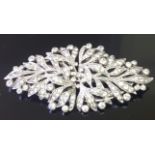 A MID 20TH CENTURY 9CT WHITE GOLD AND PASTE DUETTE BROOCH/DRESS CLIPS The symmetrical
