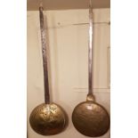 TWO 17TH/18TH CENTURY BRASS AND IRON BED WARMING PANS Of circular shape, with a pierced starburst
