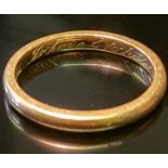 A HALLMARKED 22CT GOLD WEDDING BAND The 'D' section gold band with italic inscription to inner face,