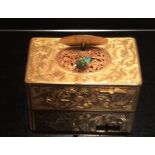 A 19TH CENTURY YELLOW METAL SWISS MUSIC BOX The engraved decoration of organic form, the with