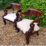 A PAIR OF 18TH/19TH CENTURY MAHOGANY TUB ARMCHAIRS The scrolling back supported on arms carved