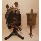 A 19TH CENTURY CLOCKWORK SPIT JACK The revolving top with bell mechanism, above a hand wind treen