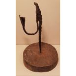 AN 18TH CENTURY IRON RUSHLIGHT AND CANDLE SOCKET The upper stem and 'U' shaped arm, with spiral