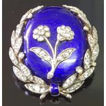A VICTORIAN PERIOD 14CT GOLD, ENAMEL AND DIAMOND SET BROOCH/LOCKET The oval form brooch having a