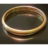 A LATE GEORGIAN GOLD POSY RING The 'D' section band with an inscription to inner face, in Italic