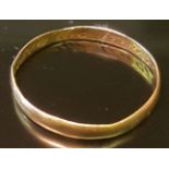 A 19TH CENTURY GOLD POSY RING The flat section band with an inscription to inner face in Italic