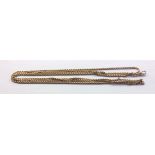 A VICTORIAN 14CT GOLD LADIES' GUARD CHAIN The double link with hoop clasp (tests as 14ct). (approx