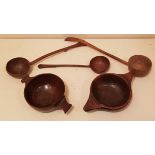 TWO ANTIQUE TREEN TWO HANDLED PORRINGERS Along with three treen sauce ladles. (10cm, 11.5cm, 19cm,