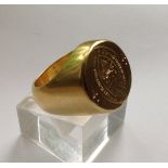 A VERY HEAVY LATE VICTORIAN SOLID 18CT GOLD BISHOP'S SIGNET RING The circular bezel with seal
