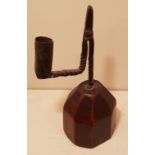 AN 18TH CENTURY IRON TABLE RUSHLIGHT AND CANDLE SOCKET The spiral twist stem and bracket arm, set on