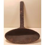 A 17TH/18TH CENTURY CAST IRON GRISSET On three leg. (bowl 25cm)