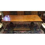 AN 18TH/19TH CENTURY WALNUT AND OAK REFECTORY TABLE The plane top, raised on two bulbous pillars,