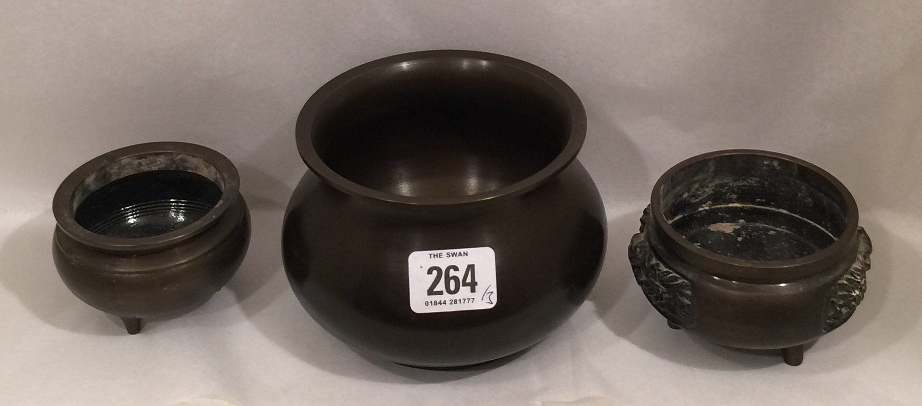 THREE ORIENTAL BRONZE CENSERS.