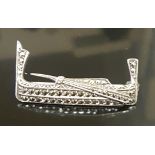 A VINTAGE SILVER AND MARCASITE GONDOLA BROOCH Stamped '925' to reverse. (3.6cm)