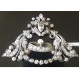 A LATE VICTORIAN 'BELLE ÉPOQUE' STYLE DIAMOND AND PEARL BROOCH/PENDANT The open foliate and swagged